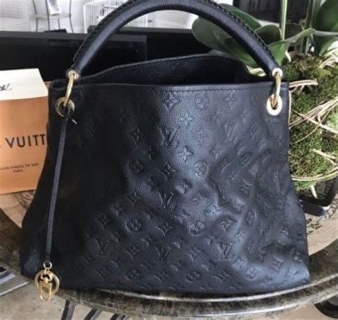 black and gold louis vuitton|black louis vuitton handbag.